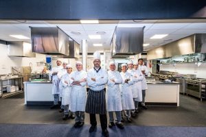 Commercial Cookery class with trainer at Barrington college